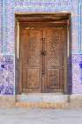 Khiva, Xorazm Region, Uzbekistan, Central Asia. Carved and decorated wooden door at the Khan Palace Art Print
